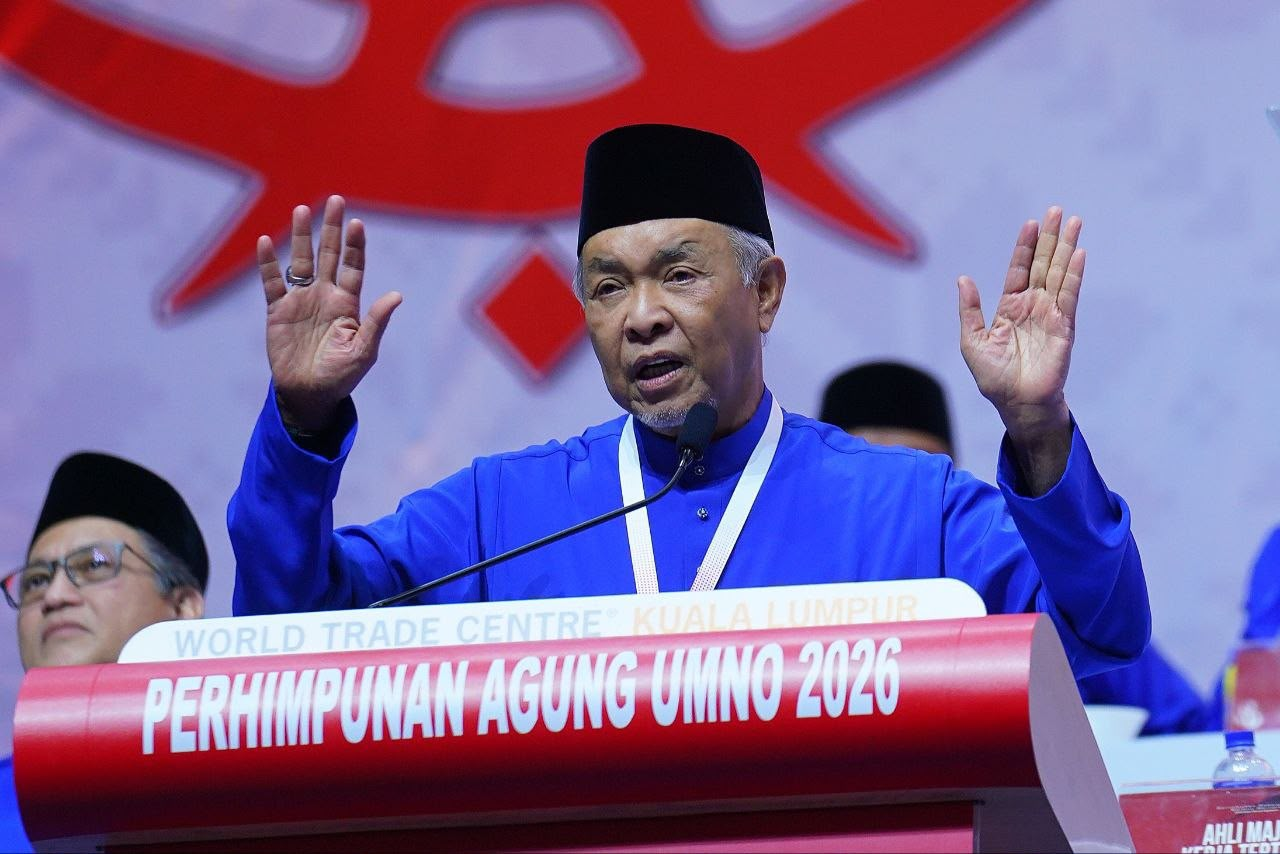 Winding up the party's general assembly, Umno president Datuk Seri Dr Ahmad Zahid Hamidi said the party was saddened by the board's decision, though he stopped short of detailing what was discussed at the closed-door meeting. Photo by Halim Wahid
