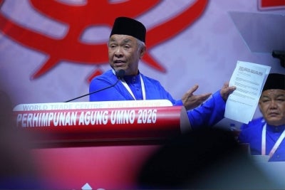 Umno president Datuk Seri Ahmad Zahid Hamidi has publicly read out portions of the Memorandum of Understanding on Cooperation between Barisan Nasional (BN) and Pakatan Harapan (PH), which formed the basis for the establishment of the Malaysia Unity Government. (Photo by Halim Wahid) 