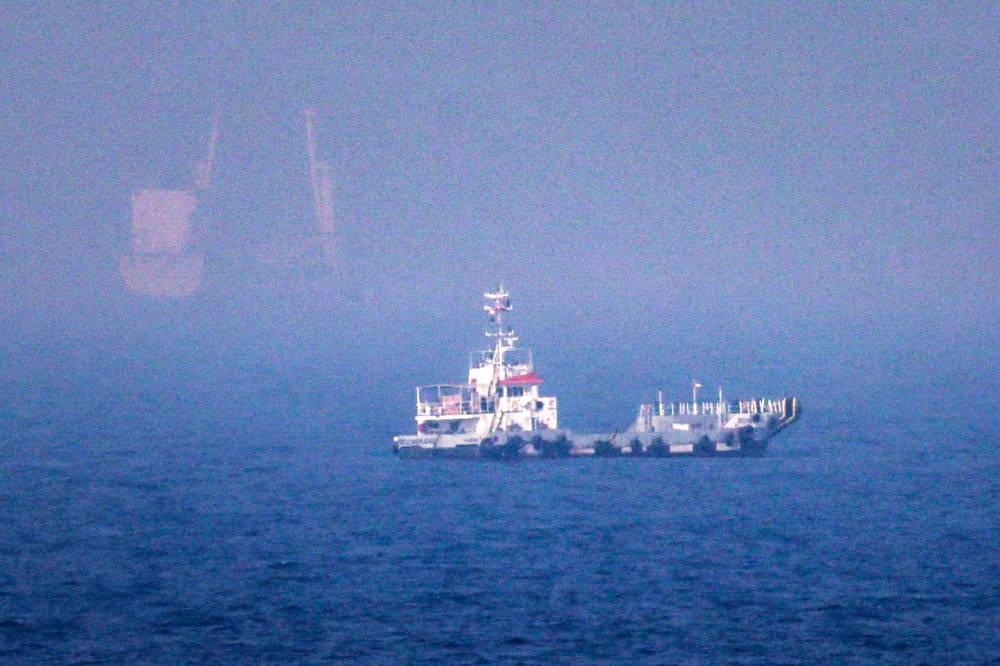 This picture shows ships sailing near the Strait of Hormuz. - AFP FILE PIX