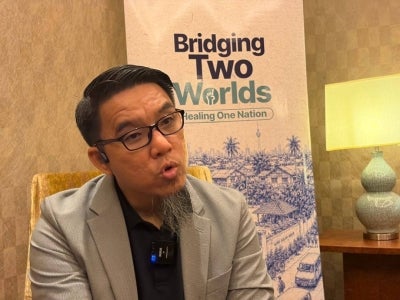 Multiracial Reverted Muslims president Firdaus Wong at the New Muslims Community Conference 2026, themed "Bridging Two Worlds, Healing One Nation" held in Kuala Lumpur, today. - Photo by NORSHAMILA SYAHMA MOHD GHAZNI