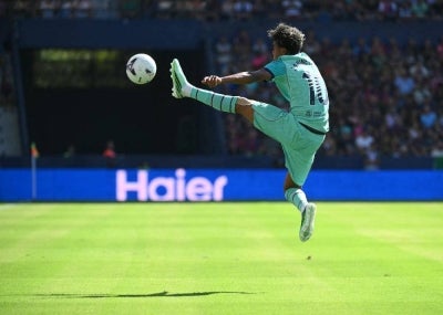 Barcelona's Spanish forward #10 Lamine Yamal controls the ball during the Spanish league football match between Levante UD and FC Barcelona at Ciutat de Valencia Stadium in Valencia. -AFP