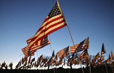 American flags fly at a display of nearly 3,000 flags at Pepperdine University, honoring lives lost during the Sept 11 terrorist attacks, on Sept 10, 2026 in Malibu, California.- (Photo by MARIO TAMA / Getty Images via AFP)