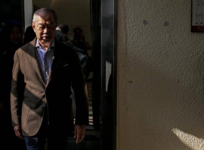 The High Court today acquitted and discharged former Prime Minister Tan Sri Muhyiddin Yassin of one charge of using his position to obtain a RM200 million bribe and three money laundering charges involving the same amount. Bernama FILE PIX
