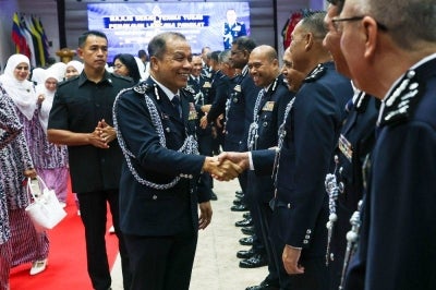 Inspector-General of Police Tan Sri Mohd Khalid Ismail at the Senior Police Officer Rank Insignia Presentation and Handover of Duties Ceremony at the Kuala Lumpur Police Training Centre. -Bernama Photo
