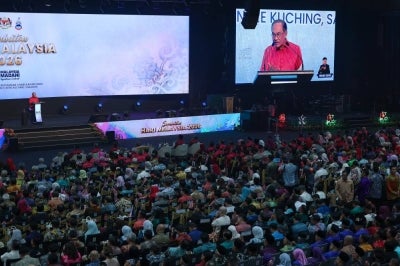Prime Minister Datuk Seri Anwar Ibrahim delivers his speech at the 2026 National-level Malaysia Day celebration at the Borneo Convention Centre Kuching, last night. - Photo by Bernama