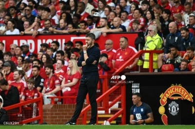 Manchester United's English head coach Michael Carrick (C) looks on at the start of the English Premier League football match between Manchester United and Ipswich Town at Old Trafford in Manchester, north west England, on August 30, 2026. (Photo by Paul ELLIS / AFP)