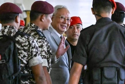 Former prime minister Datuk Seri Najib Razak has expressed gratitude to Malaysians who have offered to help him meet the RM50 million condition attached to his conditional pardon. - (Photo by MOHD RASFAN / AFP / FILE)