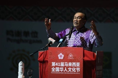 Prime Minister Datuk Seri Anwar Ibrahim delivers his speech at the 41st Malaysia Chinese Cultural Festival opening ceremony at Encore Theatre Melaka, Klebang here last night. Photo by Bernama