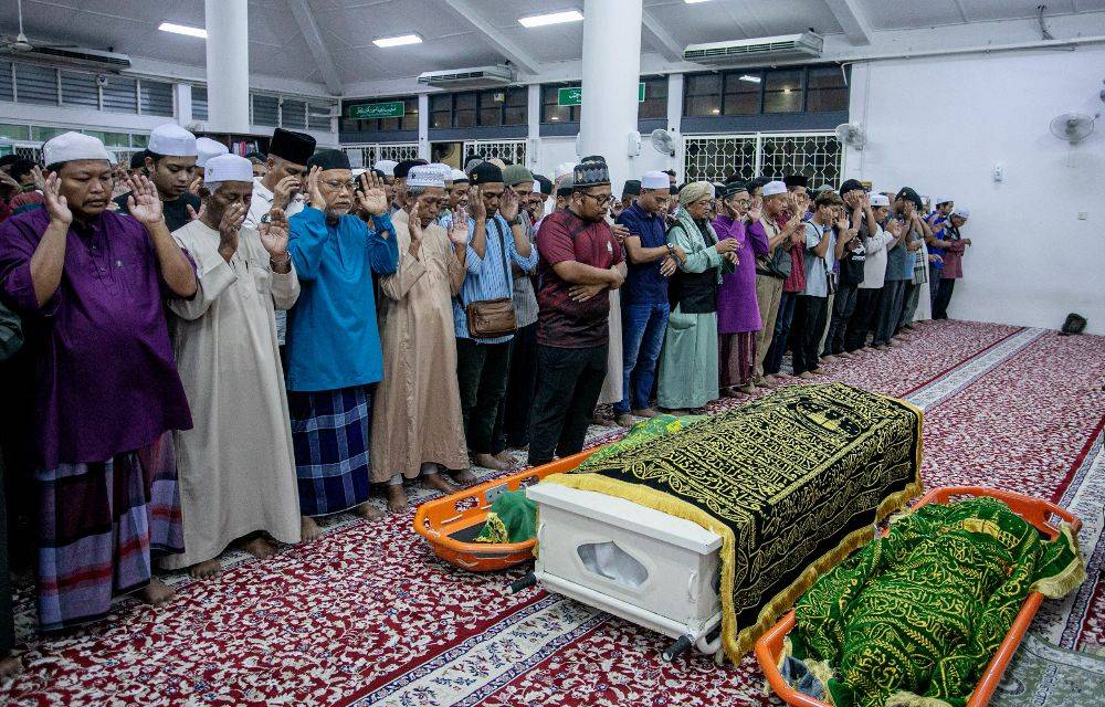 A fire tore through a two-storey terrace house in Persiaran Desa Tambun 4, Taman Desa Tambun here in the early hours of Sep 20, killing three members of the same family. - Photo by Bernama