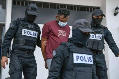 G. Vikneswaran, 43, nodded in understanding after the charge was read out before Magistrate Nur Hamizah Mat Shah, but no plea was recorded as the case falls under the jurisdiction of the High Court. Photo by Bernama