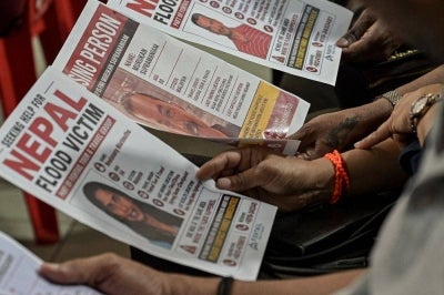 Family members of those still missing attend a press conference on Malaysians who remain unaccounted for following the massive floods along the Nepal border, at Ti-Ratana Welfare Society Malaysia in Desa Petaling. –Bernama FILE PIX