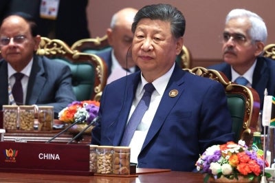 China's President Xi Jinping (Photo by Alexander KAZAKOV / POOL / AFP) / 