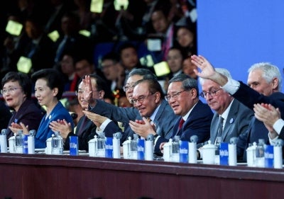 Prime Minister Datuk Seri Anwar Ibrahim and Chinese Premier Li Qiang wave to the Malaysian contingent at the 48th WorldSkills Competition Shanghai 2026 at the Shanghai World Expo Cultural Centre. -Bernama PIX