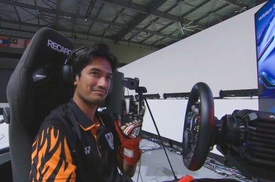 Taj Izrin Aiman Taj Madira competes in the Gran Turismo 7 (GT7) esports event at the Aichi-Nagoya 2026 Asian Games in Nagoya. -MESF FACEBOOK