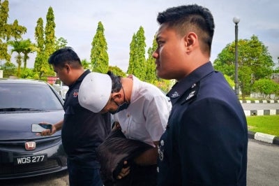 Former Religious Kafa teacher Abdullah Mustakim, 33, was fined RM2,000 by the Magistrate’s Court today for kicking a Year Five pupil in the face, causing injuries to his gums. - Photo by Bernama