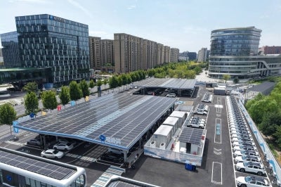 A solar-powered EV charging station and service area. (Photo by CN-STR / AFP) / China OUT