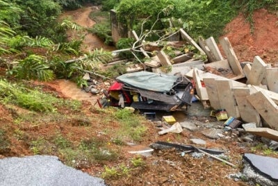 The 57-year-old lorry driver and his wife, 55, who was travelling with him, were unharmed in the incident, which occurred at about 3.40 pm. Photo by IHSAN POLIS