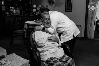 Prime Minister Anwar Ibrahim hugging his brother, Idrus. Photo posted on Anwar Ibrahim's Facebook.