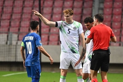 Israel's captain #10 Manor Solomon and Republic of Ireland's defender #05 Jake O'Brien Adam. (Photo by Attila KISBENEDEK / AFP)