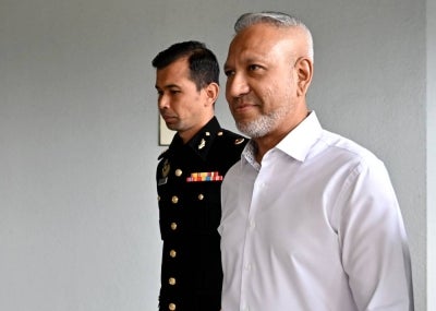 Former CEO of Felda Investment Corporation Sdn Bhd (FIC) Mohd Zaid Abdul Jalil faced two charges at the Sessions Court today for deceiving the FIC board of directors. - Photo by Bernama