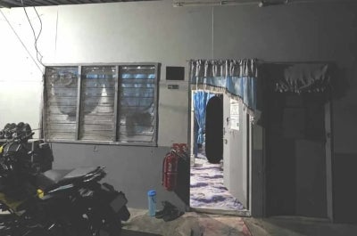 The scene where the Indonesian woman was found dead with injuries to her hands, head and neck in Jalan Kalabakan Monday, with police investigating her husband’s alleged involvement in the case.