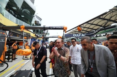Prime Minister Datuk Seri Anwar Ibrahim joins the Pit Lane Walk ahead of the F1 Gulf Air Bahrain Grand Prix at the Sepang International Circuit today. –Bernama Photo