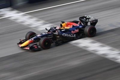 Red Bull Racing's Dutch driver Max Verstappen steers his car during the Formula One Bahrain Grand Prix in Sepang on Oct 4, 2026. - (Photo by JADE GAO / AFP)