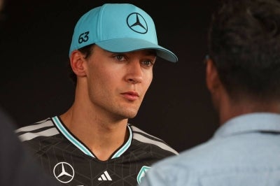 Mercedes' British driver George Russell speaks after the qualifying session of the Formula One Bahrain Grand Prix in Sepang on October 3, 2026. (Photo by I-HWA CHENG / AFP)