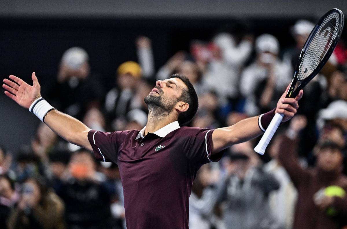Serbia's Novak Djokovic celebrates his victory over Germany’s Alexander Zverev.(Photo by Pedro PARDO / AFP)