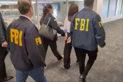 Wanying Zhang, 34, was detained by the FBI at Los Angeles airport. Source: US Dept. of Justice on X