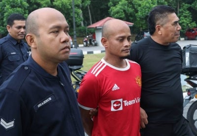 Mohd Rezuan was accused of intimidating Abdulhadee Chedah, 65, by swinging a machete at a hut next to the Kuala Krai District Council landfill. Photo by BERNAMA