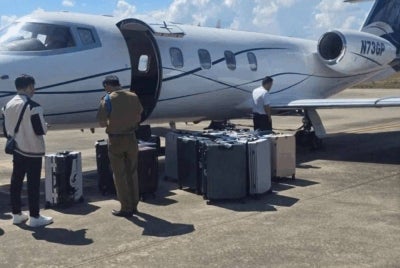 Lao authorities have seized 521 kilogrammes of crystal methamphetamine from a private jet reportedly arriving from Malaysia. Photo Source: MGR Online