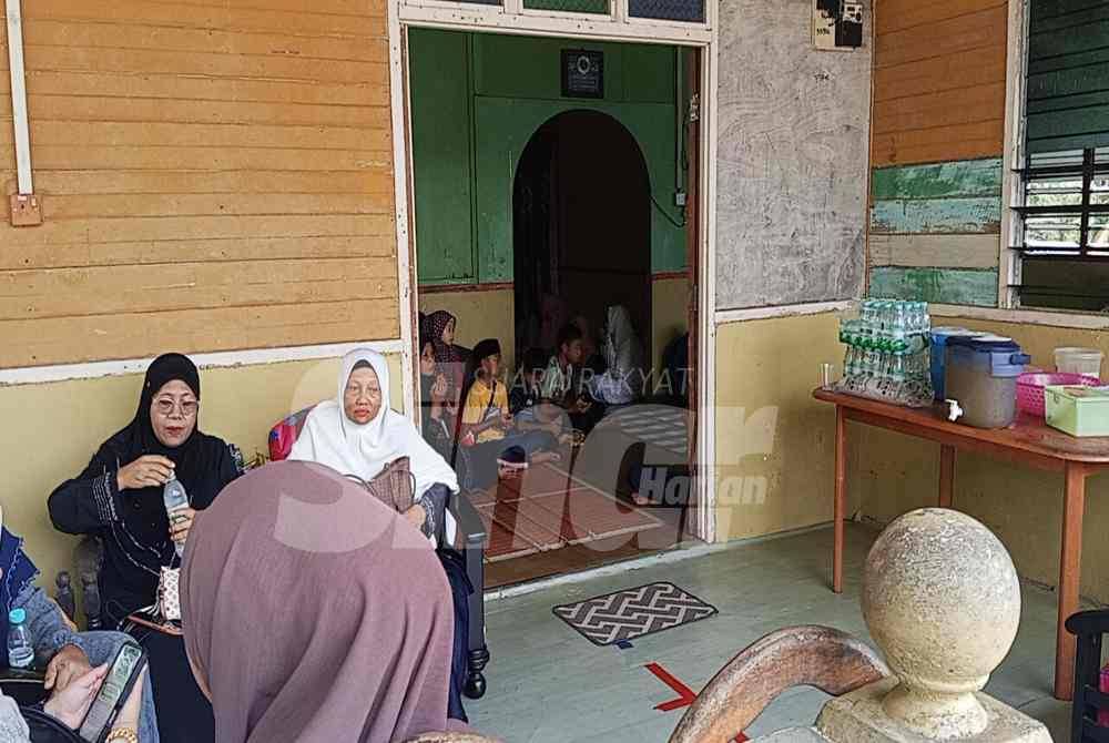 The family's home was filled with relatives and villagers following the tragedy.