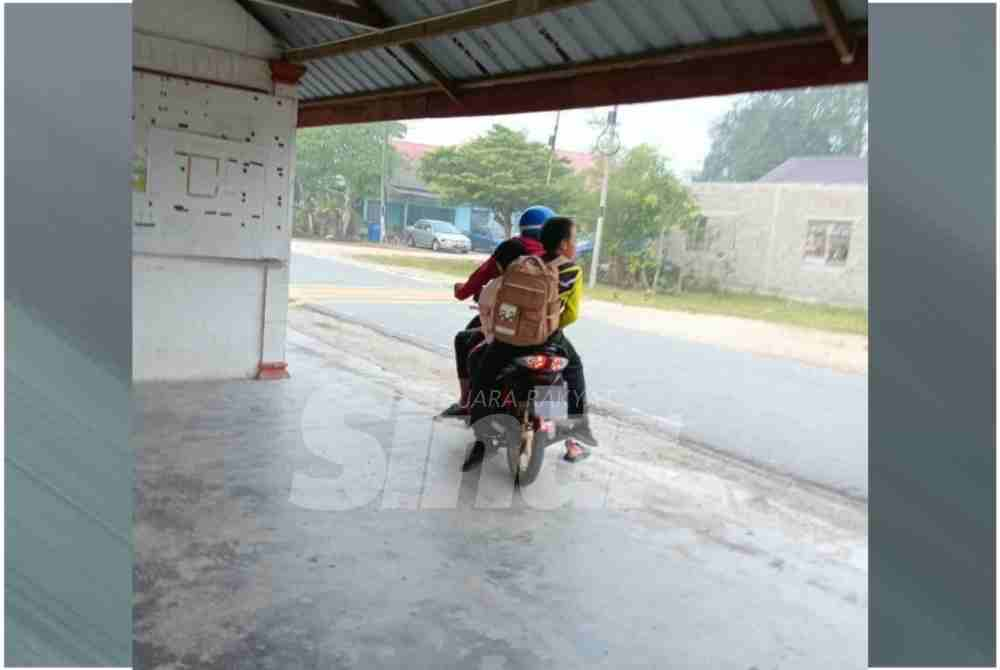 A screenshot of a viral image showing the motorcycle carrying the three siblings turning back after arriving at their school.