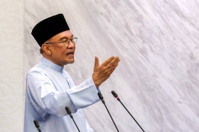 Prime Minister Datuk Seri Anwar Ibrahim, who is also Finance Minister, tables Budget 2027 in the Dewan Rakyat. -Bernama Photo