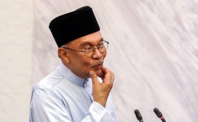 Prime Minister and Finance Minister Datuk Seri Anwar Ibrahim in the Dewan Rakyat today. Photo by Bernama