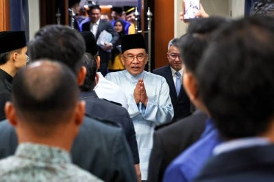 Prime Minister Datuk Seri Anwar Ibrahim, who is also the Finance Minister, after tabling the 2027 Budget, themed "Reaching for the Sky, Rooted in the Earth", in the Dewan Rakyat today. (BERNAMA PHOTO) 