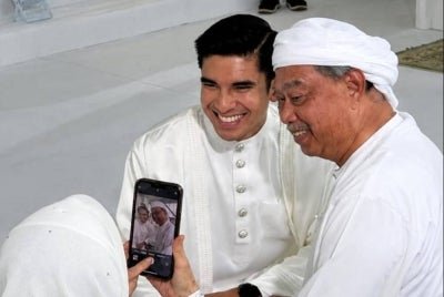 Bersatu president Muhyiddin Yassin attends the solemnisation of former party Youth chief Syed Saddiq and singer Bella Astillah. Photo: Instagram/@muhyiddinyassin_official