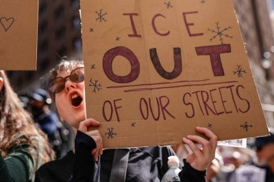 People protest against ICE (US Immigration and Customs Enforcement) in New York City on October 10, 2026.(Photo by kena betancur / AFP)