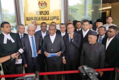 PN leaders arrive at the Kuala Lumpur High Court on Tuesday.