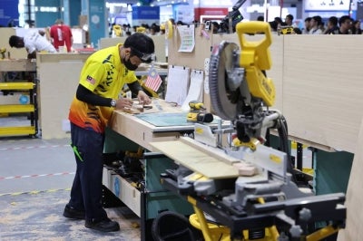 Malaysian participant in the Cabinet Making category from TVETMARA Lumut Khairul Idham Bahari during the WorldSkills Competition (WSC) Shanghai 2026 at the National Exhibition and Convention Centre Shanghai on Sept 25, 2026. - Photo by Bernama