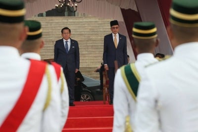 Prime Minister Datuk Seri Anwar Ibrahim (right) with Myanmar President Min Aung Hlaing receive an official welcome at Perdana Putra on Oct 8, 2026, in conjunction with his two-day official visit to Malaysia. - Photo by Bernama
