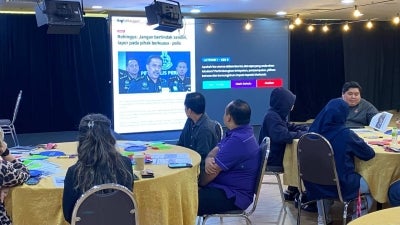 Participants at the Communications and Multimedia Content Forum of Malaysia (CMCF) roundtable discussion on media ethics and refugee reporting at Kompleks Karangkraf in Shah Alam.