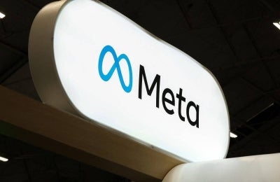 A Meta logo is pictured during the International AI Summit in Dublin, on October 14, 2026. (Photo by Paul Faith / AFP)