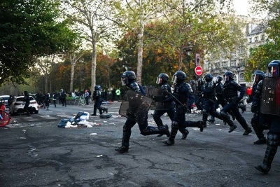 French protesters clash with police during nationwide demonstrations. (Photo by Matthieu RONDEL / AFP)