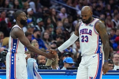 On paper, Philadelphia's starting five looks like a daunting prospect, boasting two former MVPs and a former Finals MVP. Photo by AFP