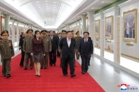 This picture taken on October 11, 2026 and released by North Korea's official Korean Central News Agency (KCNA) on October 13, 2026 shows North Korean leader Kim Jong Un (C) and his daughter Kim Ju Ae touring the Second Economic Committee National Defense Revolution Museum in Pyongyang. (Photo by Handout / KCNA / AFP)