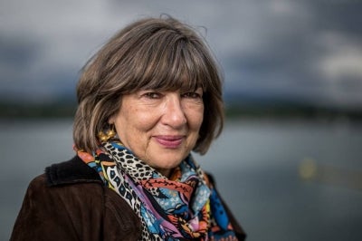 British-Iranian journalist and television host Christiane Amanpour poses for a photograph during the presentation of the exhibition "Dessins pour la liberte" (Cartoons for peace), marking the international press freedom day on the shores of Lake Geneva, in Geneva on May 3, 2024. (Photo by Fabrice COFFRINI / AFP)