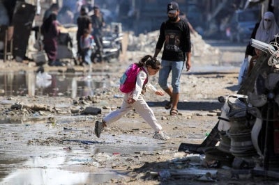 Approximately 800,000 children remain displaced, with most living in tents or dangerous, bomb-damaged buildings. - Photo by AFP