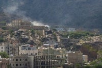 Smoke billows from a site that was targeted during battles between Saudi-backed Yemeni government fighters and Yemen's Iran-backed Houthis at the Jabal Han front west of the city of Taiz on Oct 21, 2026. - (Photo by AHMAD AL-BASHA / AFP)